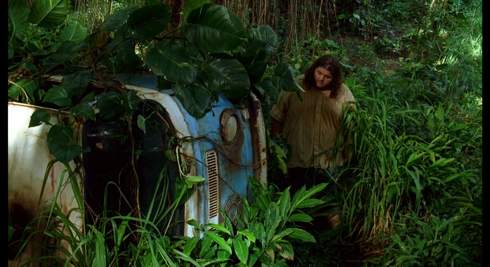 Hurley comes upon a overturned van in the jungle.